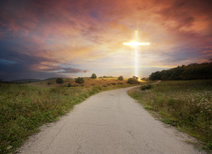 a road leads up to a bright glowing cross SQNckkflC thumb