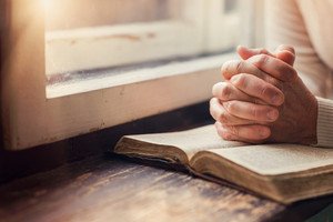 graphicstock hands of an unrecognizable woman with bible