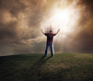 man lifting up his soul and arms on grassy field S7ZXNyMlR thumb