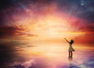 woman stands in praise before a beautiful night sky rmMqykGgC thumb