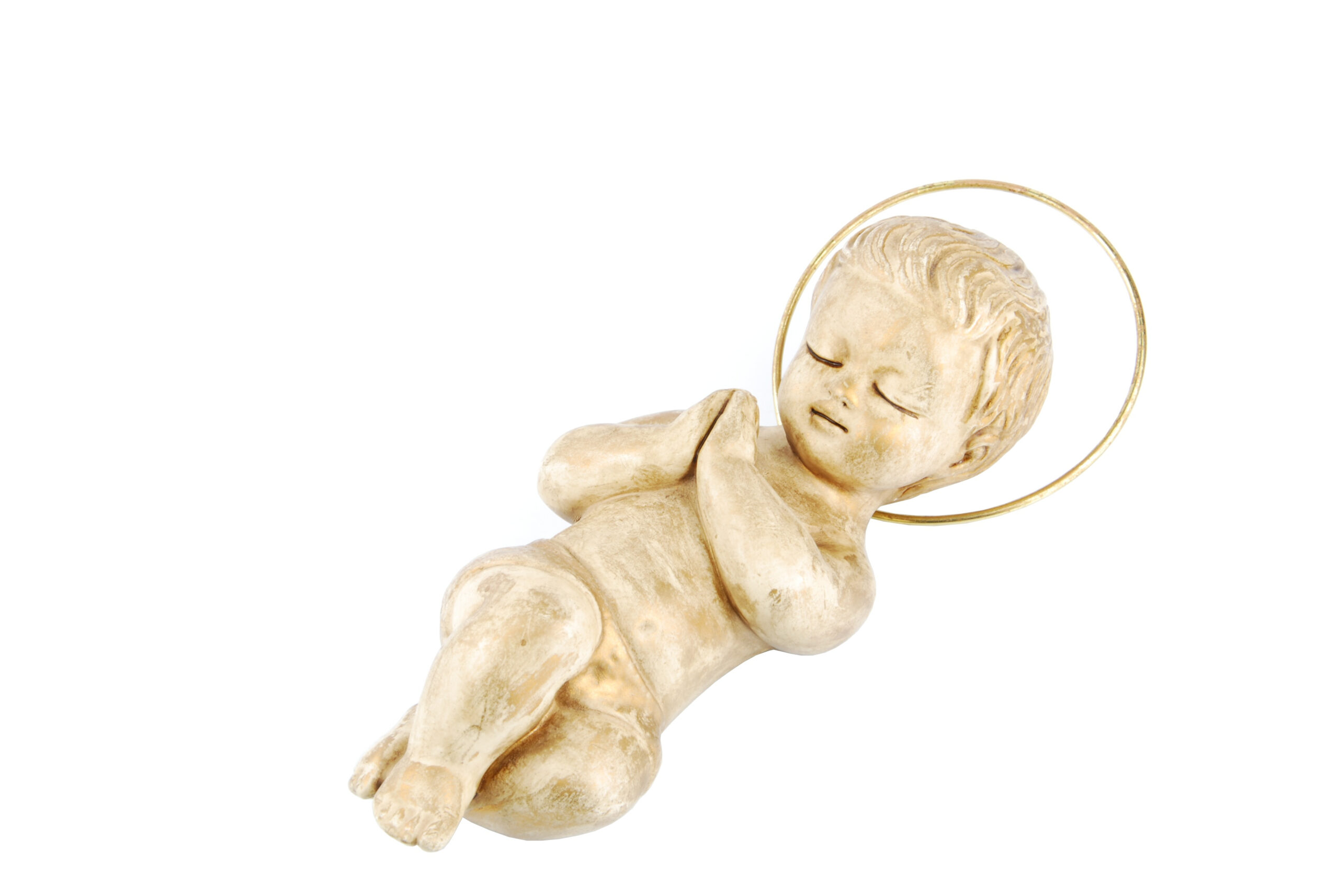 golden baby jesus lying on white QJ4lVE scaled