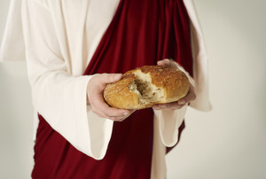storyblocks close up of jesus hands with bread of life BDv6U tcM thumb