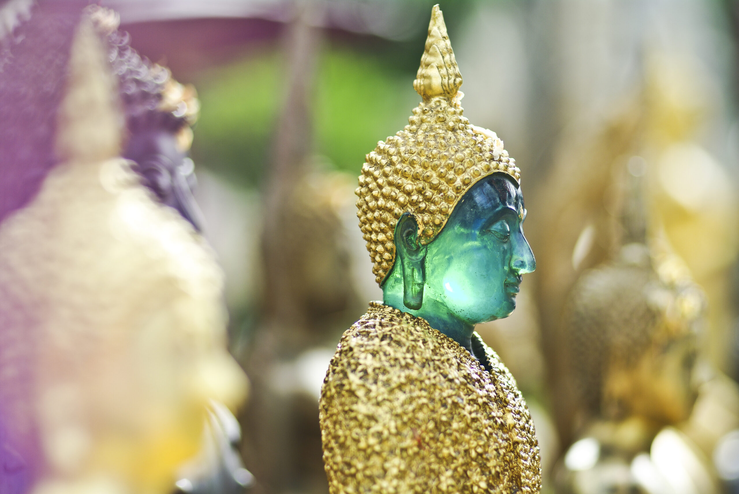 face of thai buddha green statue closeup Sva9lunzx scaled