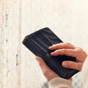 graphicstock unrecognizable woman holding a bible in her hands HRMhLuXaZZ