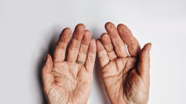 Unleashing the Power of Biblical Prayers: Building Unity and Connection 12 top view of two empty female hands over grey background senior woman hands pleading wrinkled palms of aged woman with copy space STW ePUEKx