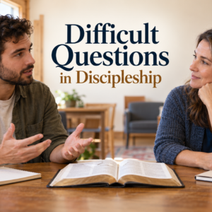 Two adults listening and talking during a thoughtful faith conversation