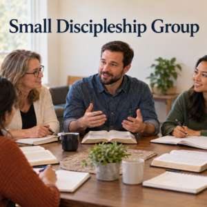 Adults reading the Bible together in a small discipleship group